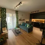 Em